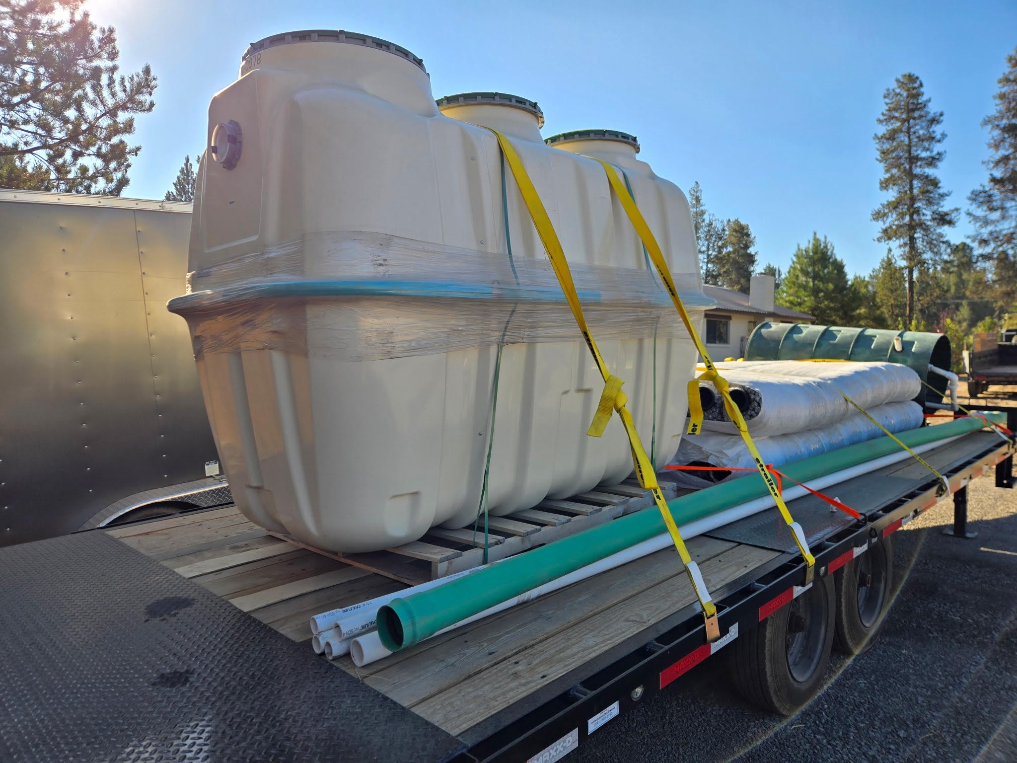 Water storage tanks on flatbed trailer